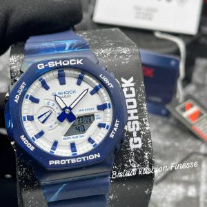 GSHOCK GA2100 WRISTWATCH with features and abilities such as ALARM STOPWATCH GMT WORLD TIME DIGITAL LEDLIGHT TIMER BACKGROUND DISPLAY LUMINOUS ANALOG TIME SYSTEM