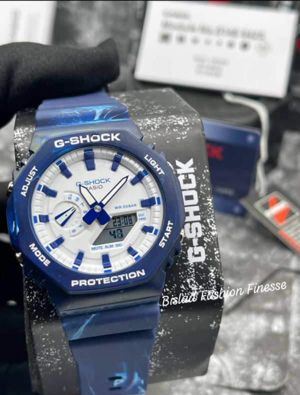 GSHOCK GA2100 WRISTWATCH with features and abilities such as ALARM STOPWATCH GMT WORLD TIME DIGITAL LEDLIGHT TIMER BACKGROUND DISPLAY LUMINOUS ANALOG TIME SYSTEM